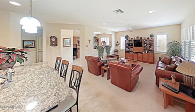 Live the Robson Resort lifestyle in this beautifully maintained on Quail Creek Country Club  in Arizona - for sale on GolfHomes.com, golf home, golf lot