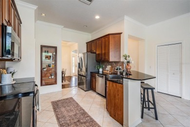 Stop scrolling--this is the one. Tucked inside one of on Westchase Golf Club in Florida - for sale on GolfHomes.com, golf home, golf lot