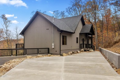 This brand-new construction, 4 BR, 5 BA pool cabin has recently on Bent Creek Golf Course in Tennessee - for sale on GolfHomes.com, golf home, golf lot