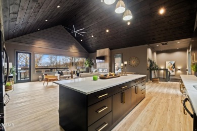 This brand-new construction, 4 BR, 5 BA pool cabin has recently on Bent Creek Golf Course in Tennessee - for sale on GolfHomes.com, golf home, golf lot