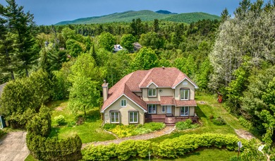 Welcome to your dream Adirondack retreat! This expansive on  in New York - for sale on GolfHomes.com, golf home, golf lot