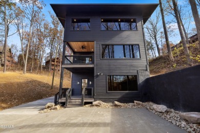 This brand-new construction, 2 BR, 4 BA, pool cabin has recently on Bent Creek Golf Course in Tennessee - for sale on GolfHomes.com, golf home, golf lot