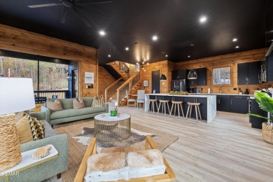 This brand-new construction, 2 BR, 4 BA, pool cabin has recently on Bent Creek Golf Course in Tennessee - for sale on GolfHomes.com, golf home, golf lot