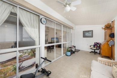 Drive-up location 1 bed/1 bath home with enclosed patio and on Leisure World Seal Beach Golf Course in California - for sale on GolfHomes.com, golf home, golf lot