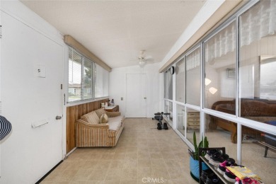 Drive-up location 1 bed/1 bath home with enclosed patio and on Leisure World Seal Beach Golf Course in California - for sale on GolfHomes.com, golf home, golf lot