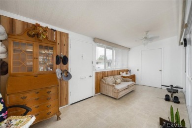 Drive-up location 1 bed/1 bath home with enclosed patio and on Leisure World Seal Beach Golf Course in California - for sale on GolfHomes.com, golf home, golf lot