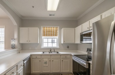 Check out this pristine 2-bedroom, 2-bath furnished villa on Barefoot Resort and Golf Club  in South Carolina - for sale on GolfHomes.com, golf home, golf lot