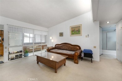 Drive-up location 1 bed/1 bath home with enclosed patio and on Leisure World Seal Beach Golf Course in California - for sale on GolfHomes.com, golf home, golf lot