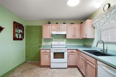 Welcome to this beautiful maintained 2-bedroom, 2 bath  Austin on The Links of Spruce Creek in Florida - for sale on GolfHomes.com, golf home, golf lot