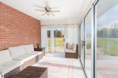 Check out this fantastic 3-bedroom, 2-bathroom brick ranch that on Pine River Country Club in Michigan - for sale on GolfHomes.com, golf home, golf lot