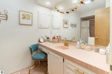 Check out this fantastic 3-bedroom, 2-bathroom brick ranch that on Pine River Country Club in Michigan - for sale on GolfHomes.com, golf home, golf lot