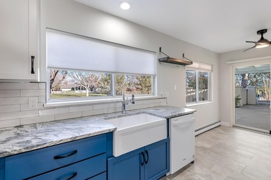 Backs to the 5th green of Tiara Rado Golf Course - Updated on Tiara Rado Golf Course in Colorado - for sale on GolfHomes.com, golf home, golf lot