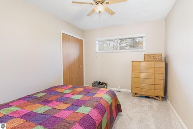 Check out this fantastic 3-bedroom, 2-bathroom brick ranch that on Pine River Country Club in Michigan - for sale on GolfHomes.com, golf home, golf lot