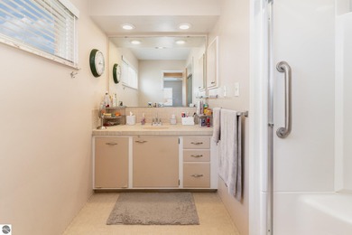 Check out this fantastic 3-bedroom, 2-bathroom brick ranch that on Pine River Country Club in Michigan - for sale on GolfHomes.com, golf home, golf lot