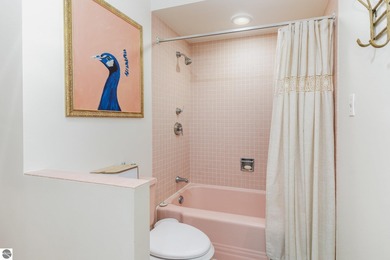 Check out this fantastic 3-bedroom, 2-bathroom brick ranch that on Pine River Country Club in Michigan - for sale on GolfHomes.com, golf home, golf lot