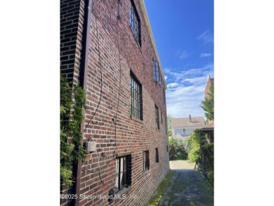 A RARE opportunity to own a well-maintained, all brick 6 family on Silver Lake Golf Course in New York - for sale on GolfHomes.com, golf home, golf lot