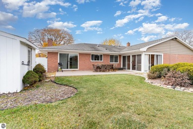 Check out this fantastic 3-bedroom, 2-bathroom brick ranch that on Pine River Country Club in Michigan - for sale on GolfHomes.com, golf home, golf lot