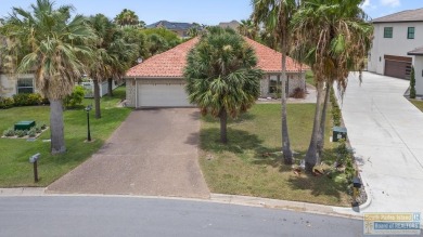 This 3-bedroom, 2-bath home features a spacious, private, and on South Padre Island Golf Club in Texas - for sale on GolfHomes.com, golf home, golf lot