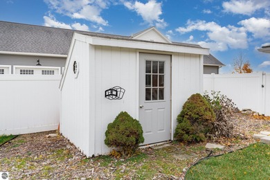 Check out this fantastic 3-bedroom, 2-bathroom brick ranch that on Pine River Country Club in Michigan - for sale on GolfHomes.com, golf home, golf lot