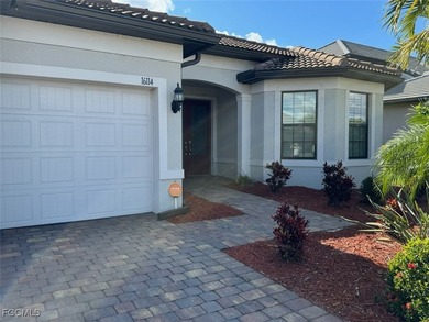 Located within the gated River Hall Country Club, this on River Hall Country Club in Florida - for sale on GolfHomes.com, golf home, golf lot