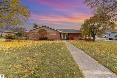 Check out this fantastic 3-bedroom, 2-bathroom brick ranch that on Pine River Country Club in Michigan - for sale on GolfHomes.com, golf home, golf lot