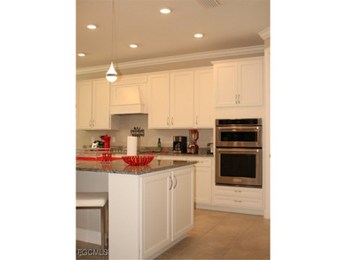 Located within the gated River Hall Country Club, this on River Hall Country Club in Florida - for sale on GolfHomes.com, golf home, golf lot