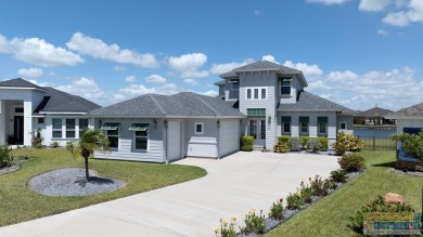 Your home in paradise awaits you. This immaculate 2 story on South Padre Island Golf Club in Texas - for sale on GolfHomes.com, golf home, golf lot
