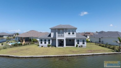Your home in paradise awaits you. This immaculate 2 story on South Padre Island Golf Club in Texas - for sale on GolfHomes.com, golf home, golf lot