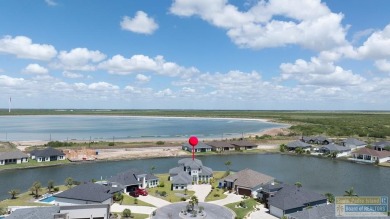 Your home in paradise awaits you. This immaculate 2 story on South Padre Island Golf Club in Texas - for sale on GolfHomes.com, golf home, golf lot