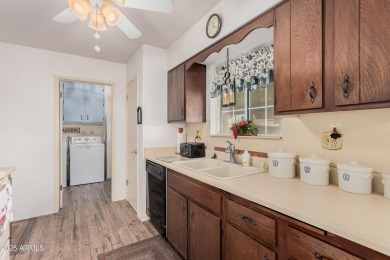 This gemini home is located in the vibrant-active 55+ community on Sun City Country Club in Arizona - for sale on GolfHomes.com, golf home, golf lot