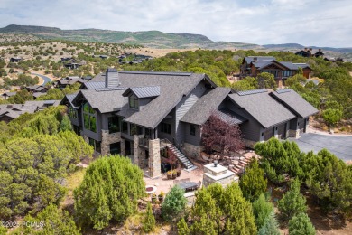 This stunning mountain retreat offers panoramic views of Mt on Red Ledges Golf Club in Utah - for sale on GolfHomes.com, golf home, golf lot