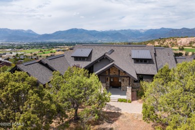 This stunning mountain retreat offers panoramic views of Mt on Red Ledges Golf Club in Utah - for sale on GolfHomes.com, golf home, golf lot