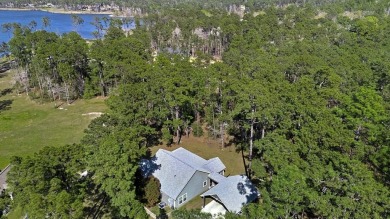 This charming 2-bedroom, 2-bath custom-built home sits on a on Rayburn Country Club in Texas - for sale on GolfHomes.com, golf home, golf lot