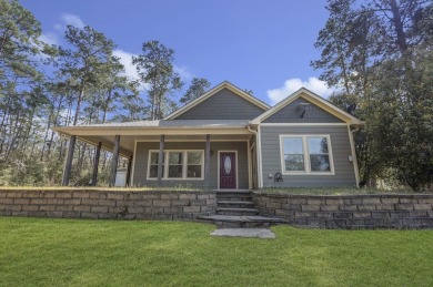 This charming 2-bedroom, 2-bath custom-built home sits on a on Rayburn Country Club in Texas - for sale on GolfHomes.com, golf home, golf lot