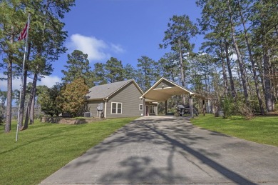 This charming 2-bedroom, 2-bath custom-built home sits on a on Rayburn Country Club in Texas - for sale on GolfHomes.com, golf home, golf lot