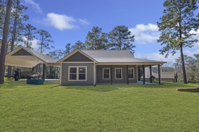 This charming 2-bedroom, 2-bath custom-built home sits on a on Rayburn Country Club in Texas - for sale on GolfHomes.com, golf home, golf lot