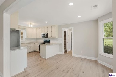 Welcome to this beautifully renovated 4-bedroom, 2.5-bath home on Elizabethtown Country Club in Kentucky - for sale on GolfHomes.com, golf home, golf lot