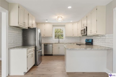 Welcome to this beautifully renovated 4-bedroom, 2.5-bath home on Elizabethtown Country Club in Kentucky - for sale on GolfHomes.com, golf home, golf lot