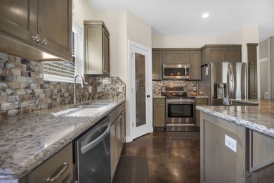 This charming 2-bedroom, 2-bath custom-built home sits on a on Rayburn Country Club in Texas - for sale on GolfHomes.com, golf home, golf lot