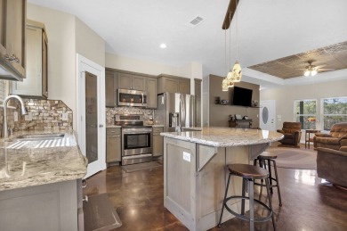 This charming 2-bedroom, 2-bath custom-built home sits on a on Rayburn Country Club in Texas - for sale on GolfHomes.com, golf home, golf lot