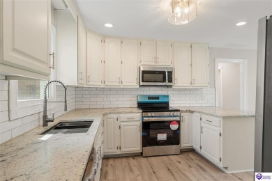 Welcome to this beautifully renovated 4-bedroom, 2.5-bath home on Elizabethtown Country Club in Kentucky - for sale on GolfHomes.com, golf home, golf lot