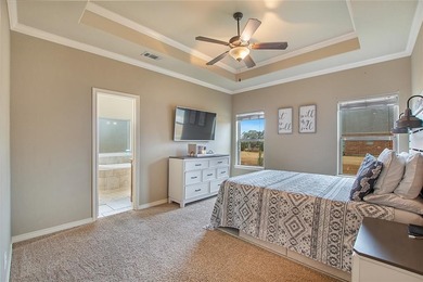 Welcome to this charming 3-bedroom, 2-bath home that offers an on Star Harbor Golf Club in Texas - for sale on GolfHomes.com, golf home, golf lot