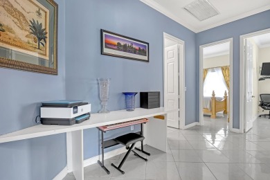 Welcome to this charming one-story home in Madison Green, Royal on The Links At Madison Green in Florida - for sale on GolfHomes.com, golf home, golf lot