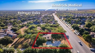 Mid-century modern commercial office on large lot. Located near on Abilene Country Club - South Course in Texas - for sale on GolfHomes.com, golf home, golf lot