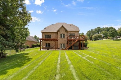 Welcome to this spacious 5-bedroom, 3.5-bathroom home nestled in on Meadowlands Golf Club in North Carolina - for sale on GolfHomes.com, golf home, golf lot