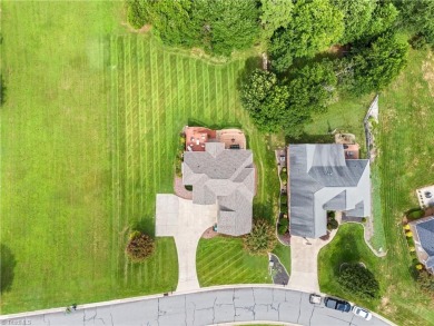 Welcome to this spacious 5-bedroom, 3.5-bathroom home nestled in on Meadowlands Golf Club in North Carolina - for sale on GolfHomes.com, golf home, golf lot