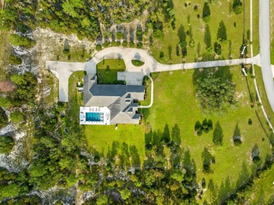 Discover the perfect blend of privacy, luxury, and estate living on Windswept Dunes Golf Club in Florida - for sale on GolfHomes.com, golf home, golf lot