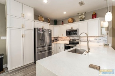 Exquisitely remodeled 3BR/2BA villa in the gated SPI Golf on South Padre Island Golf Club in Texas - for sale on GolfHomes.com, golf home, golf lot