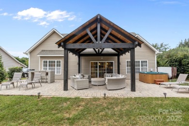 Nestled in a highly desirable neighborhood near Lake Norman on Cowans Ford Country Club in North Carolina - for sale on GolfHomes.com, golf home, golf lot