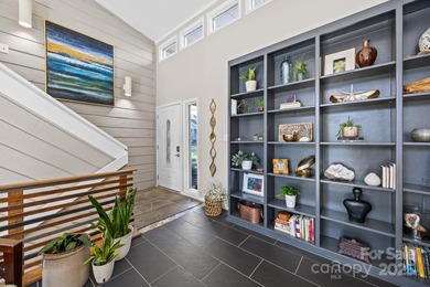 Discover this exceptional end-unit townhome, offering an on Raintree Country Club in North Carolina - for sale on GolfHomes.com, golf home, golf lot